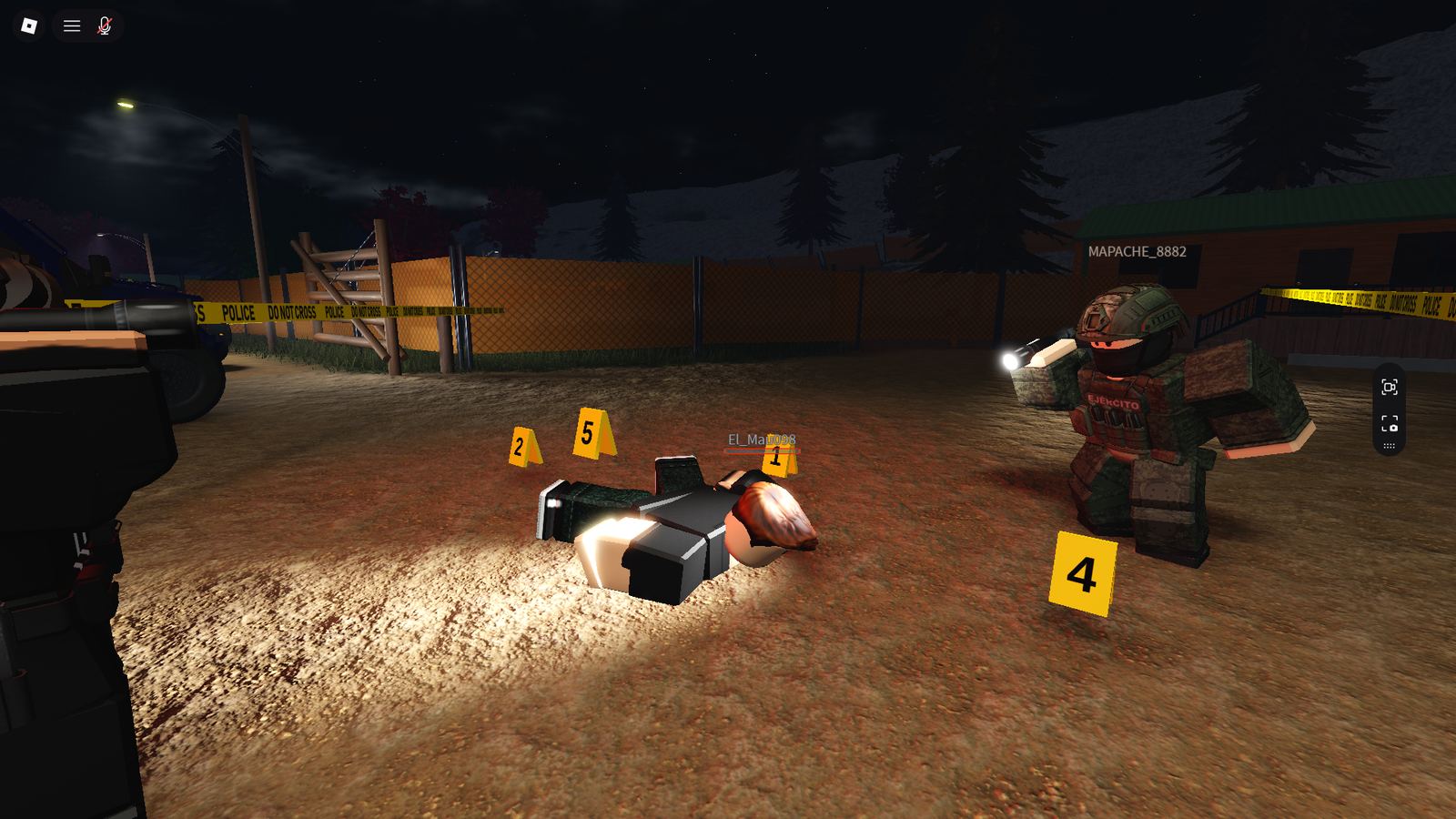 Escena nocturna con evidencia numerada